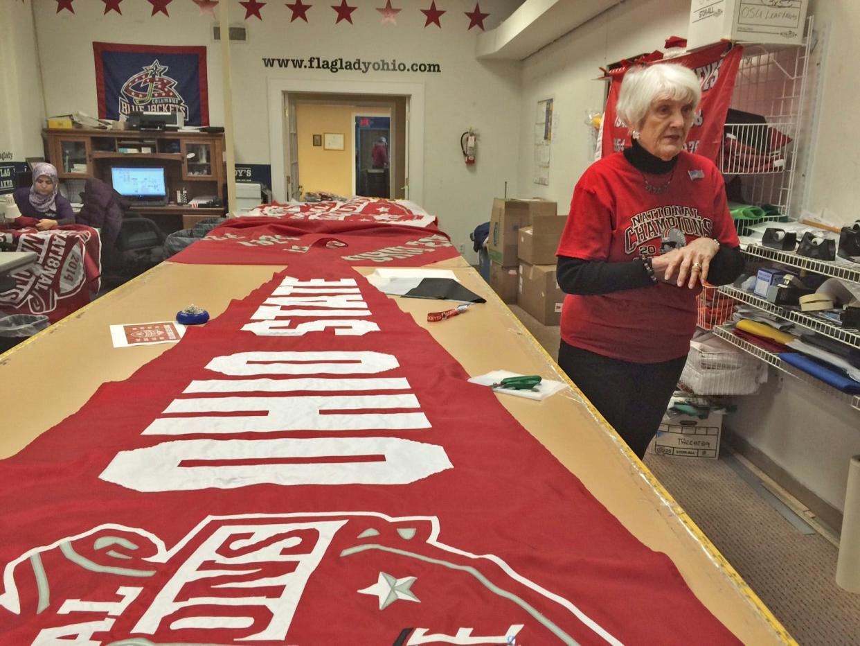 Mary Leavitt, known as The Flag Lady, in a 2015 photo at her strore. She died Monday, Dec. 4, 2023, at age 87.