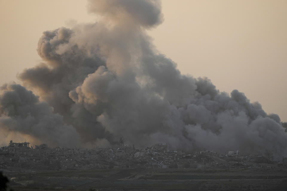 Smoke rises following an Israeli bombardment in the Gaza Strip, as seen from southern Israel, Saturday, Dec. 2, 2023. (AP Photo/Leo Correa)