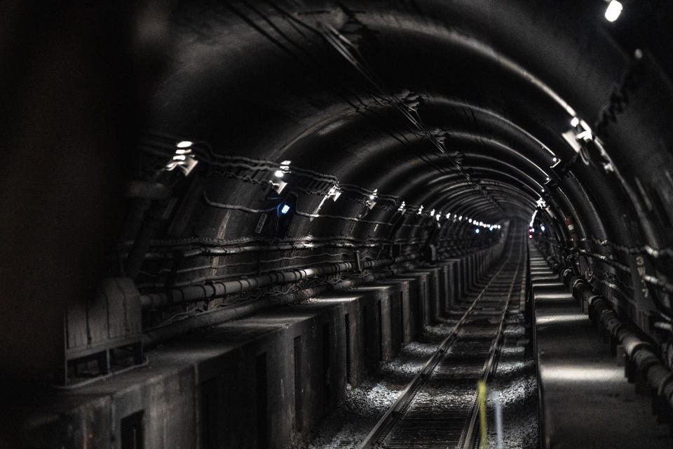 Amtrak train rails extend down an underground transit tunnel that spans the Hudson River on Manhattan's west side, Saturday, March 20, 2021, in Weehawken, N.J. With a new rail tunnel into New York years away at best, Amtrak is embarking on an aggressive and expensive program to fix a 110-year-old tunnel in the interim. (AP Photo/John Minchillo)