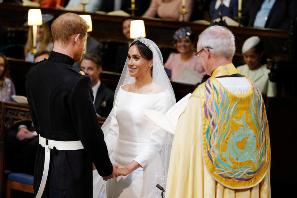 Prince Harry and Meghan Markle in St George's Chapel at Windsor Castle during their wedding service, conducted by the Archbishop of Canterbury Justin Welby.