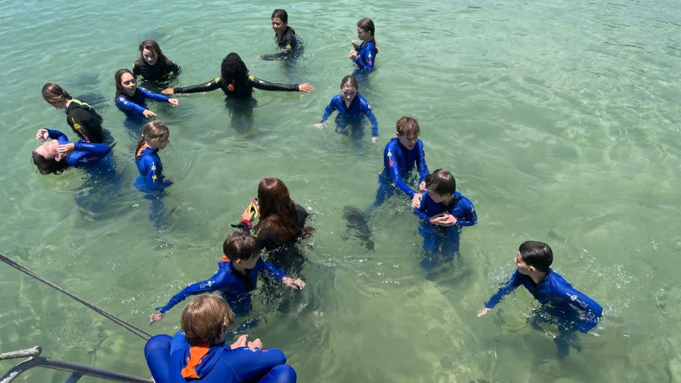 In the warm waters off the coast of Queensland, Australia, students at Belgian Gardens State School learn about the amazing coral environment on their doorstep for Call to Earth Day 2022. - Belgian Gardens State School