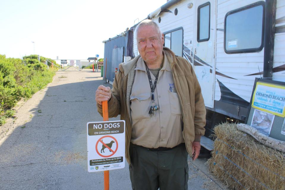 Walter Fuller stands outside his RV at Ormond Beach in Oxnard on May 8. The caretaker lives in the city-provided RV and uses the shipping container at rear as an office, but the yearslong arrangement is coming to an end.