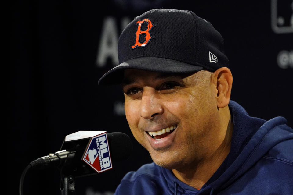 Boston Red Sox manager Alex Cora speaks to reporters prior to a baseball practice at Fenway Park, Sunday, Oct. 17, 2021, in Boston. (AP Photo/Robert F. Bukaty)