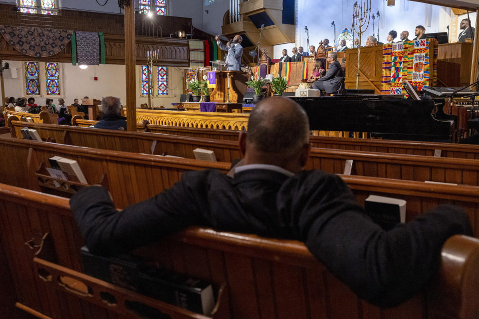 Rev. William H. Lamar IV leads a Palm Sunday service at the Metropolitan AME Church in Washington, Sunday, March 24, 2024. As Black Protestants prepare for Easter this year, they hope to welcome more people to church than since the COVID-19 pandemic began four years ago. (AP Photo/Amanda Andrade-Rhoades)