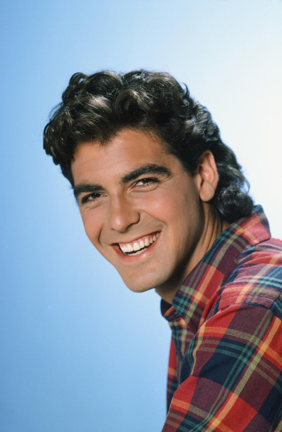 George Clooney as George Burnett smiles in a "Facts of Life" image