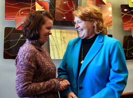 Senator Heidi Heitkamp (D-ND) meets with a group of women business owners at Jamestown College, Jamestown, North Dakota, U.S. April 6, 2018. Picture taken April 6, 2018. REUTERS/Dan Koeck