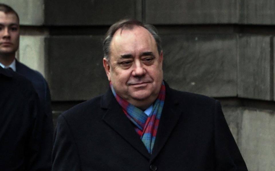 Former Scottish National Party leader Alex Salmond leaves after a preliminary hearing over allegations of sexual harassment, at the High Court in Edinburgh - AFP