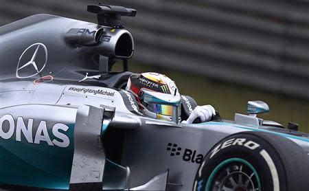 Mercedes Formula One driver Lewis Hamilton of Britain drives during the Chinese F1 Grand Prix at the Shanghai International circuit, April 20, 2014. REUTERS/Carlos Barria