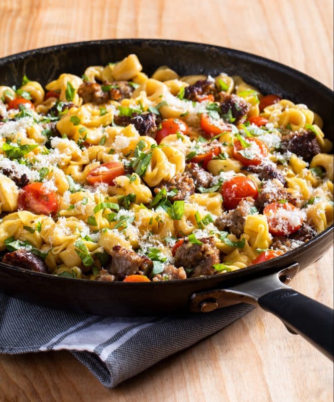 <p>This skillet pasta dish comes together in less than 30 minutes and has everything you want in a pasta dish, with cheese, spicy sausage and fresh tomatoes and basil.</p><p><strong>Get the recipe: <a href="/1245158/parade/skillet-tortellini-with-sausage-and-tomatoes/" data-ylk="slk:Skillet Tortellini With Sausage and Tomatoes;elm:context_link;itc:0;sec:content-canvas" class="link rapid-noclick-resp">Skillet Tortellini With Sausage and Tomatoes</a></strong></p>