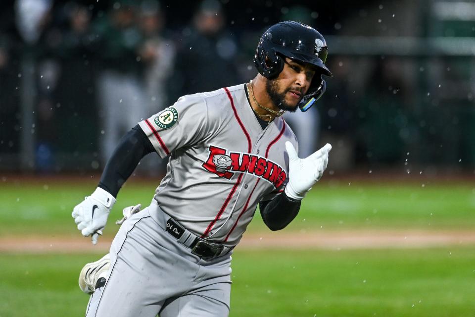 Lugnuts' Euribiel Angeles runs to first base after a hit against Michigan State in the second inning on Tuesday, April 4, 2023, during the Crosstown Showdown at Jackson Field in Lansing.