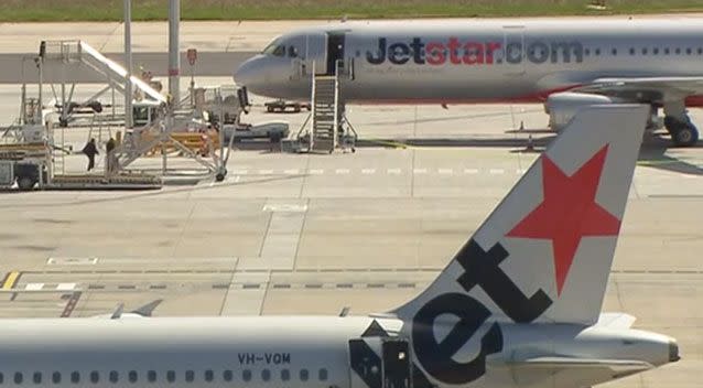 Police have been forced to taser a man trying to sneak on to a Jetstar flight. Photo: 7 News