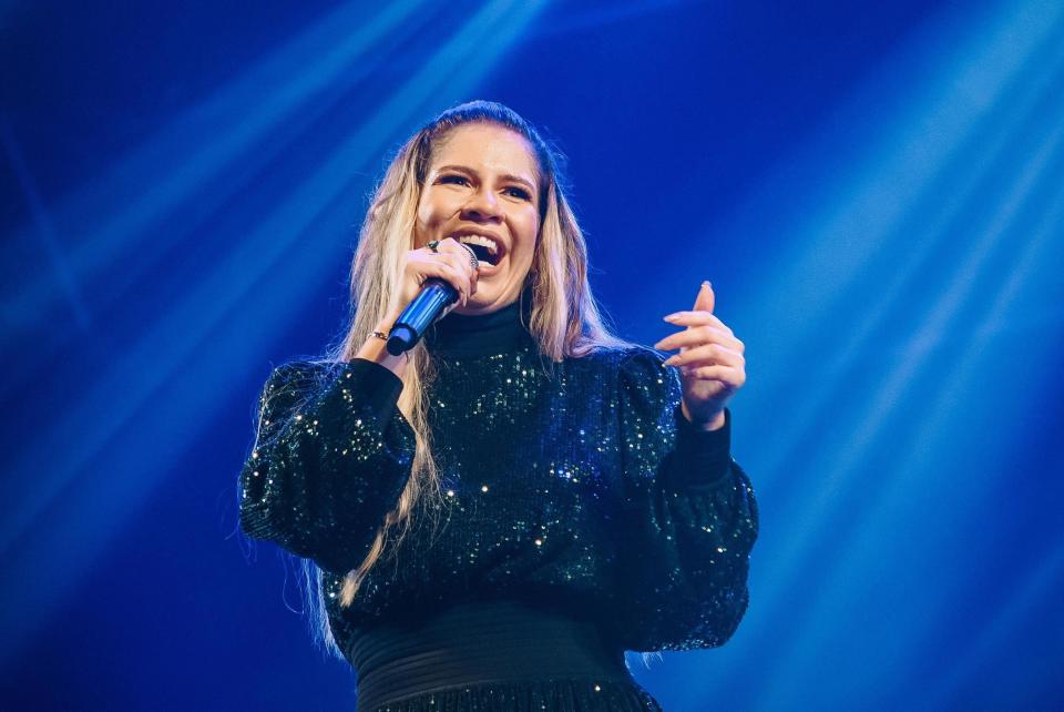 Singer Marilia Mendonça performs in Sao Jose dos Campos, Brazil, Saturday, Sept. 25, 2021. One of Brazil’s most popular singers and a Latin Grammy winner, Mendonca died on Friday, Nov. 5, 2021, in an airplane crash on her way to a concert. Mendonça was 26 and performed country music, in Brazil called sertanejo. (Will Dias/Futura Press via AP)