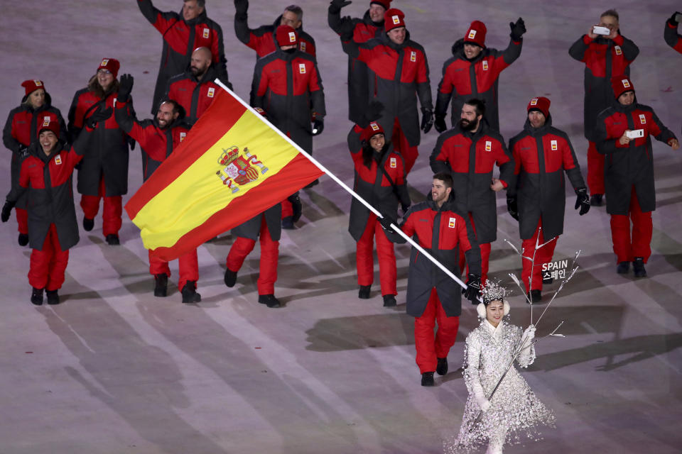 <p>Lucas Eguibar carries the flag of Spain during the opening ceremony of the 2018 Winter Olympics in Pyeongchang, South Korea, Friday, Feb. 9, 2018. (Sean Haffey/Pool Photo via AP) </p>