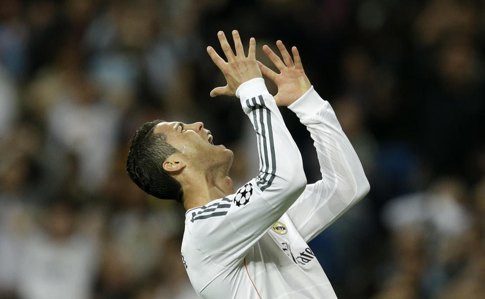 Real's Cristiano Ronaldo reacts after failing to score during a Champions League semifinal first leg soccer match between Real Madrid and Bayern Munich at the Santiago Bernabeu stadium in Madrid, Spain, Wednesday, April 23, 2014. (AP Photo/Paul White)