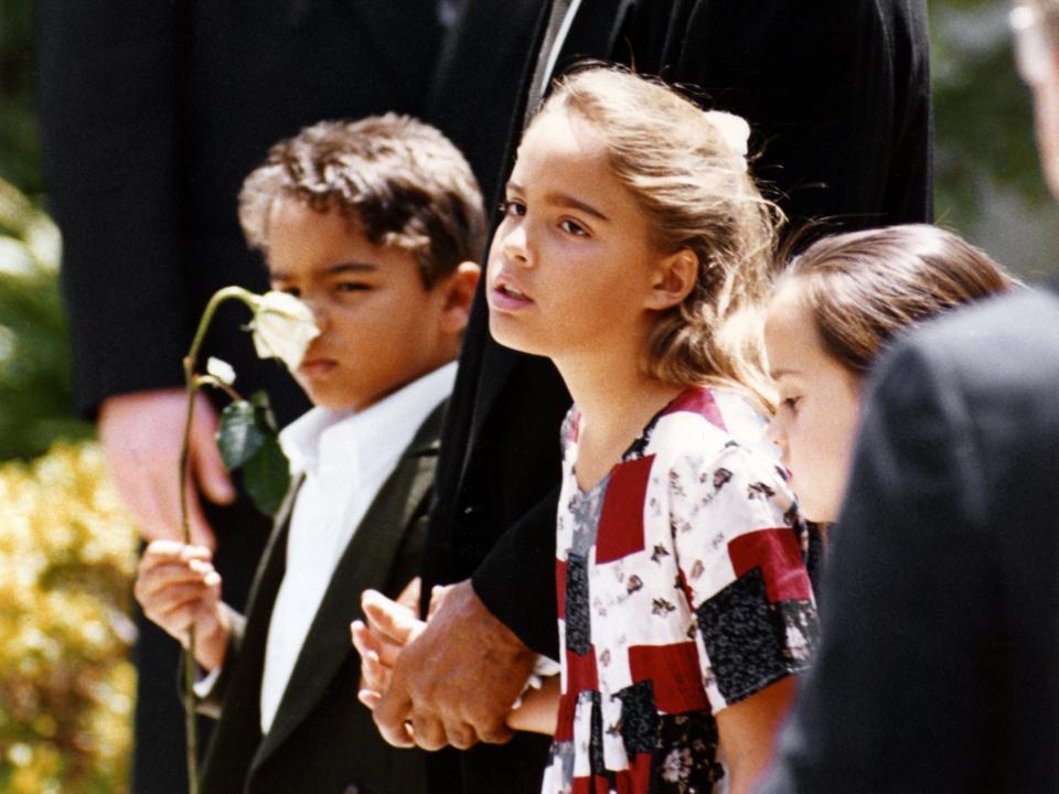 Justin Simpson and Sydney Brooke Simpson at their mother's funeral in Los Angeles.