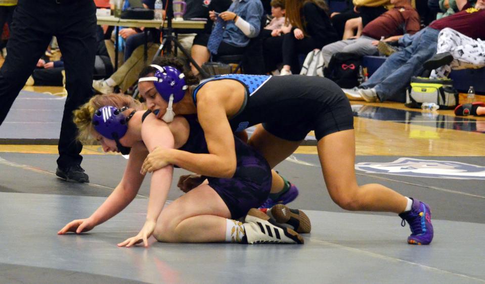 Boonsboro's Amelia Mikus, top, controls Smithsburg's Allie Grossnickle during the 2A-1A West girls final at 135 pounds.