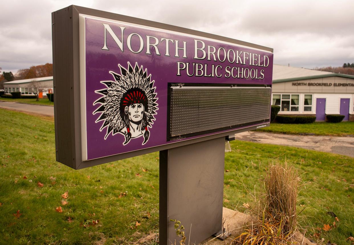 A sign outside the North Brookfield public school complex features an Indian mascot.