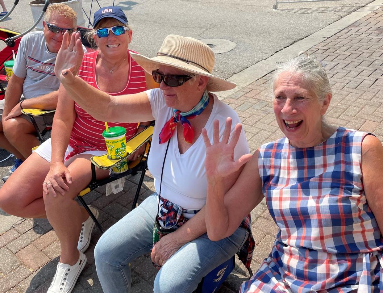 Barbara Franks, right, and friends take in the Granville July 4 parade. Franks, who was well-known in Granville for her outgoing nature and businesses, died March 28 at age 73.