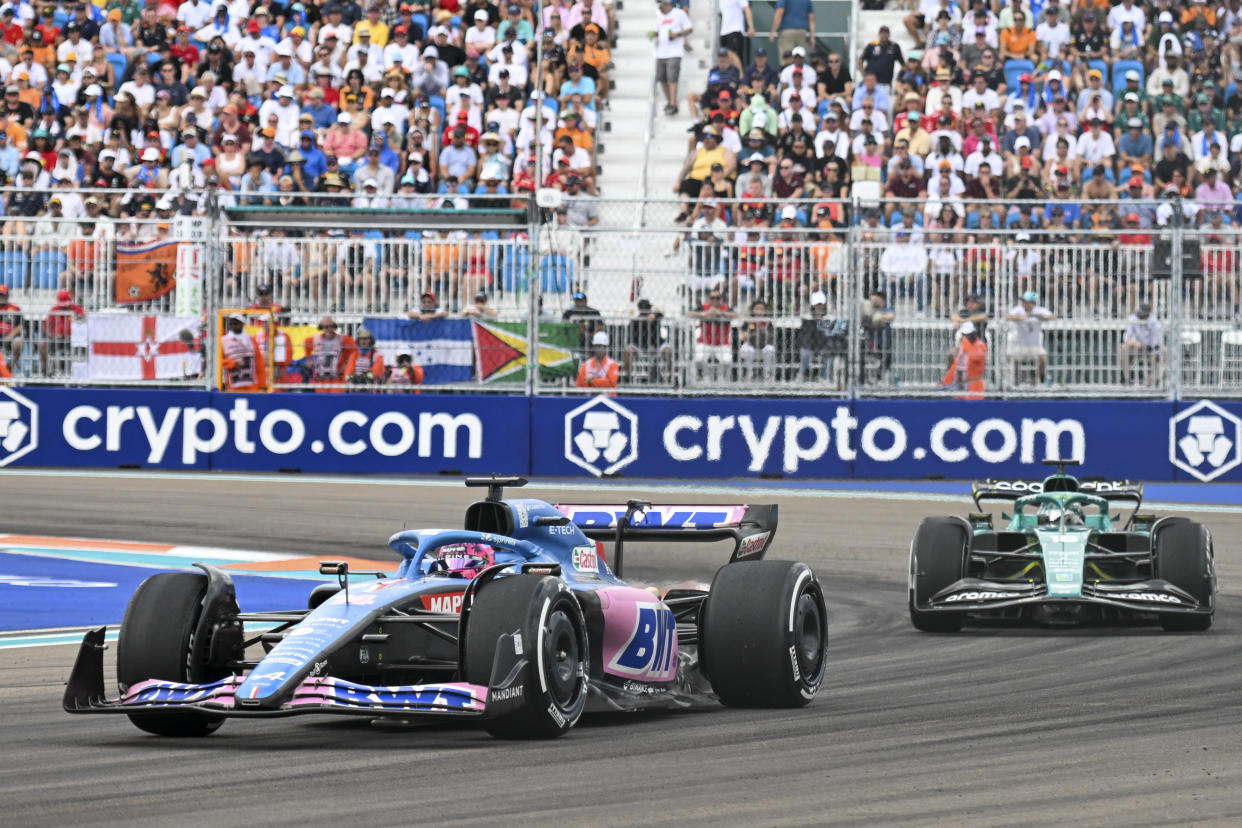 MIAMI GARDENS, FL - MAY 08: BWT Alpine driver Fernando Alonso leads Aston Martin Aramco Cognizant driver Lance Stroll during the Formula 1 CRYPTO.COM Miami Grand Prix on May 8, 2022 at Miami Autodrome in Miami Gardens, FL. (Photo by Doug Murray/Icon Sportswire via Getty Images)