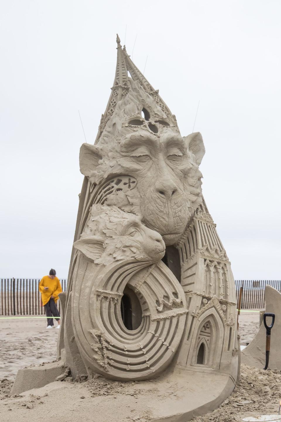 Mélineige Beauregard of Hawaii creates "Love is a Universal Temple" at the Hampton Beach Master Sand Sculpting Classic.