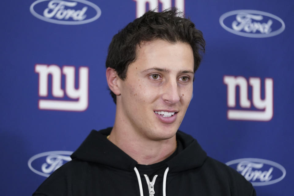 New York Giants quarterback Tommy DeVito speaking to members of the media at the end of an NFL football game against the Washington Commanders, Sunday, Nov. 19, 2023, in Landover, Md. Giants won 31-19. (AP Photo/Andrew Harnik)