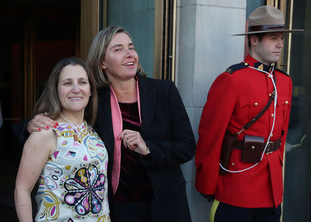 Canada's Minister of Foreign Affairs Chrystia Freeland is joined by High Representative for the European Union's Foreign Affairs Federica Mogherini prior to a reception at the Royal Ontario Museum on the first day of meetings for foreign ministers from G7 countries in Toronto, Ontario, Canada April 22, 2018. REUTERS/Fred Thornhill