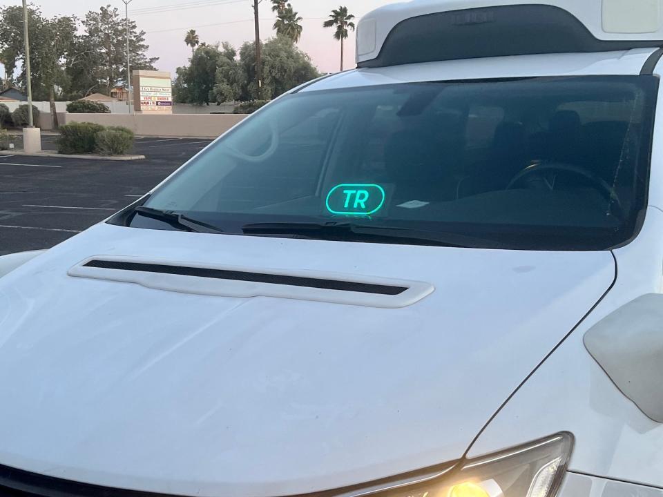 "TR" on the display on the front windshield of the car.