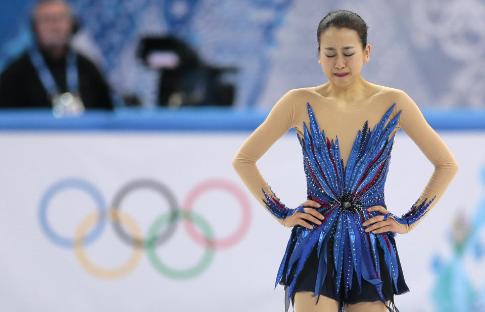 Mao Asada of Japan reacts after completing her routine in the women's free skate figure skating finals at the Iceberg Skating Palace during the 2014 Winter Olympics, Thursday, Feb. 20, 2014, in Sochi, Russia. (AP Photo/Ivan Sekretarev)