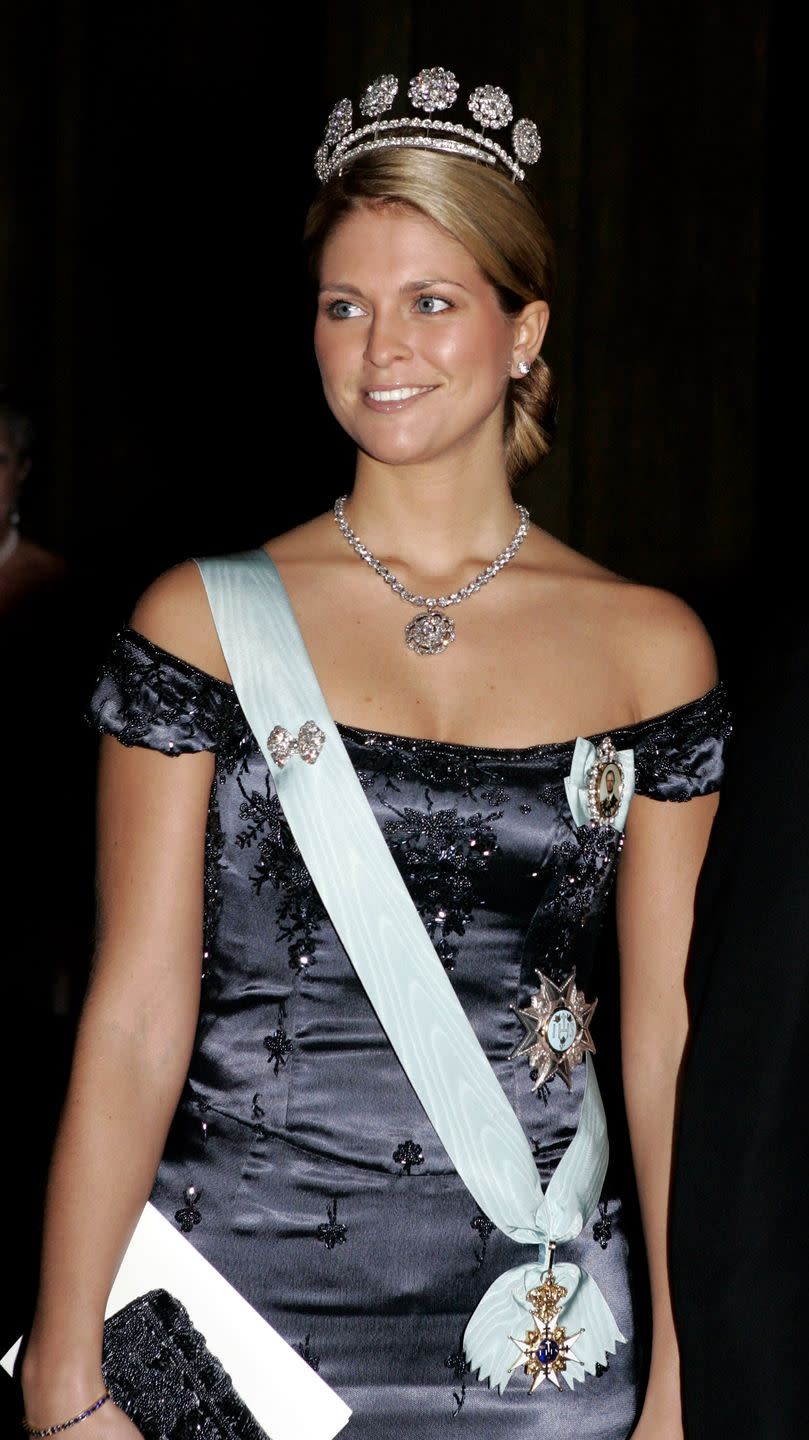 <p>Another tiara moment for the Princess! Madeleine chose the <a href="https://www.thecourtjeweller.com/2016/06/the-swedish-four-button-tiara.html" rel="nofollow noopener" target="_blank" data-ylk="slk:Swedish Four Button Tiara;elm:context_link;itc:0;sec:content-canvas" class="link ">Swedish Four Button Tiara</a> for the annual gala held in honor of Nobel Laureates at the Royal Palace in Stockholm, Sweden.</p>