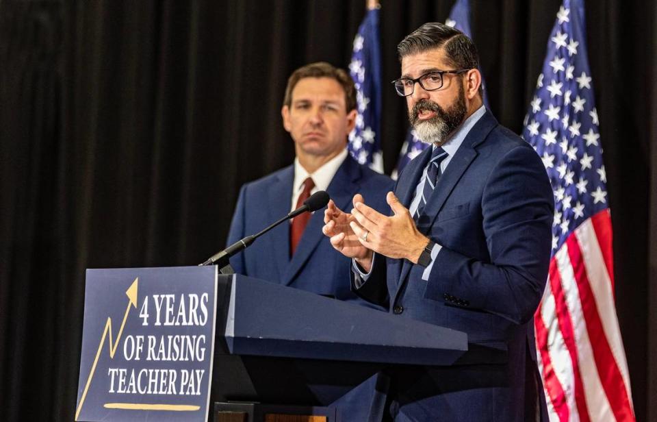 Florida education commissioner Manny Diaz Jr. joins Gov. <span class="caas-xray-inline-tooltip"><span class="caas-xray-inline caas-xray-entity caas-xray-pill rapid-nonanchor-lt" data-entity-id="Ron_DeSantis" data-ylk="cid:Ron_DeSantis;pos:2;elmt:wiki;sec:pill-inline-entity;elm:pill-inline-text;itc:1;cat:OfficeHolder;" tabindex="0" aria-haspopup="dialog"><a href="https://search.yahoo.com/search?p=Ron%20DeSantis" data-i13n="cid:Ron_DeSantis;pos:2;elmt:wiki;sec:pill-inline-entity;elm:pill-inline-text;itc:1;cat:OfficeHolder;" tabindex="-1" data-ylk="slk:Ron DeSantis;cid:Ron_DeSantis;pos:2;elmt:wiki;sec:pill-inline-entity;elm:pill-inline-text;itc:1;cat:OfficeHolder;" class="link ">Ron DeSantis</a></span></span> at a press conference at True North Classical Academy charter school in Miami. Desantis signed several educational bills at the event. Tuesday May 09, 2023. Pedro Portal/pportal@miamiherald.com