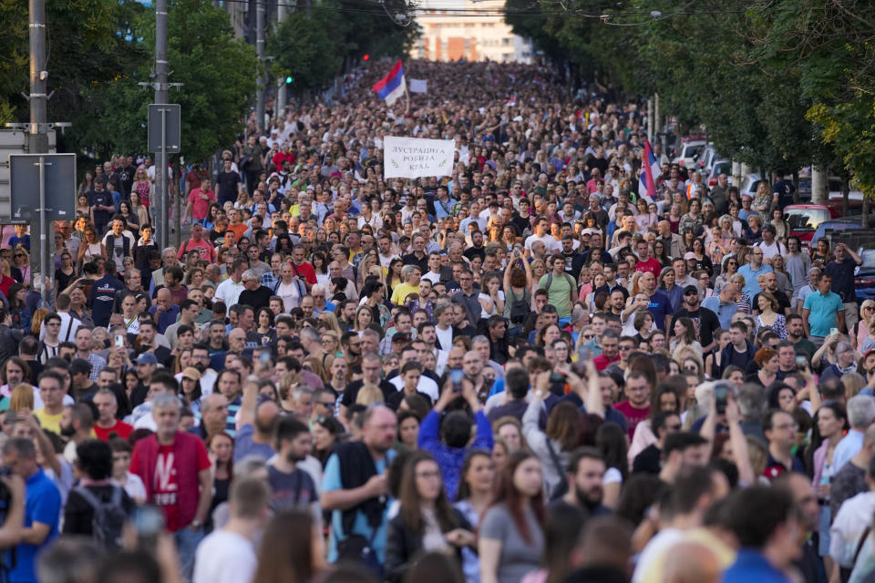 People march during a protest against violence in Belgrade, Serbia, Saturday, June 3, 2023. Tens of thousands of people rallied in Serbia's capital on Saturday for a fifth time in a month in protest at the government's handling of a crisis after two mass shootings in the Balkan country. (AP Photo/Darko Vojinovic)