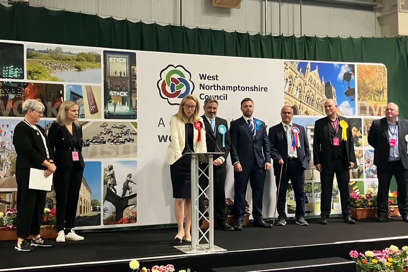 Labour candidate Lucy Rigby addressing the room after her win. (Candidates behind left to right- Antony Antoniou, Dan Bennett, Khalid Razzaq, Christopher Leggett, Paul Clark)