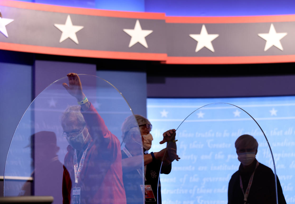 Newly installed barriers are set up on the stage ahead of the vice presidential debate in Salt Lake City, Utah. Infectious disease experts say the plexiglass is "infection prevention theater." (Photo by Justin Sullivan/Getty Images)