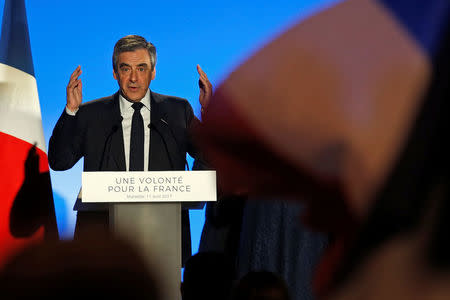 Francois Fillon, former French Prime Minister, member of the Republicans political party and 2017 French presidential election candidate of the French centre-right, delivers a speech during a political rally in Marseille, France, April 11, 2017. REUTERS/Jean-Paul Pelissier