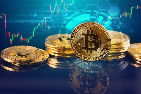   <span class="attribution"><a class="link " href="https://www.shutterstock.com/image-photo/bitcoins-new-virtual-money-conceptgold-candle-710889814?src=l37Sdn0-y_jQyrBkOhfGvA-1-55" rel="nofollow noopener" target="_blank" data-ylk="slk:Shutterstock;elm:context_link;itc:0;sec:content-canvas">Shutterstock</a></span>