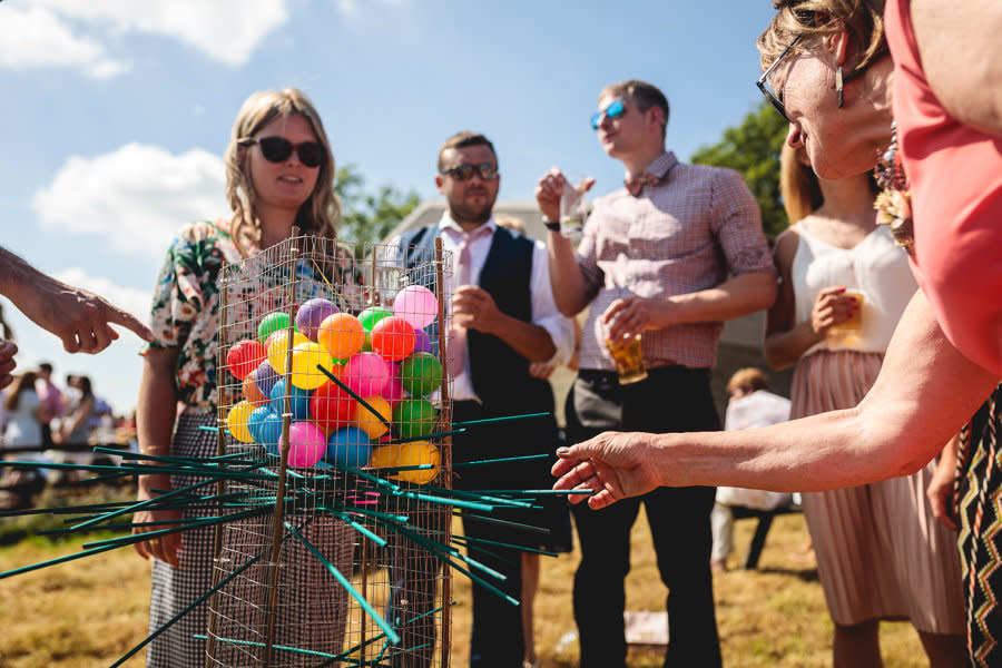 This oversized version of the <a href="https://www.amazon.com/Ker-Plunk-Game-Dont-Marbles/dp/B0000205X3" target="_blank">childhood classic</a> is a fun way&nbsp;to get&nbsp;guests to mingle during the cocktail hour.&nbsp;