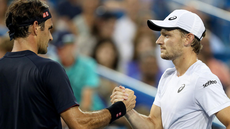 Roger Federer embraces David Goffin after the match. Pic: Getty