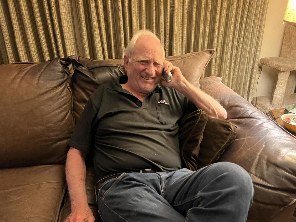 John F. Clauser speaks to reporters on the phone at his home in Walnut Creek, Calif., on Tuesday, Oct. 4, 2022.  