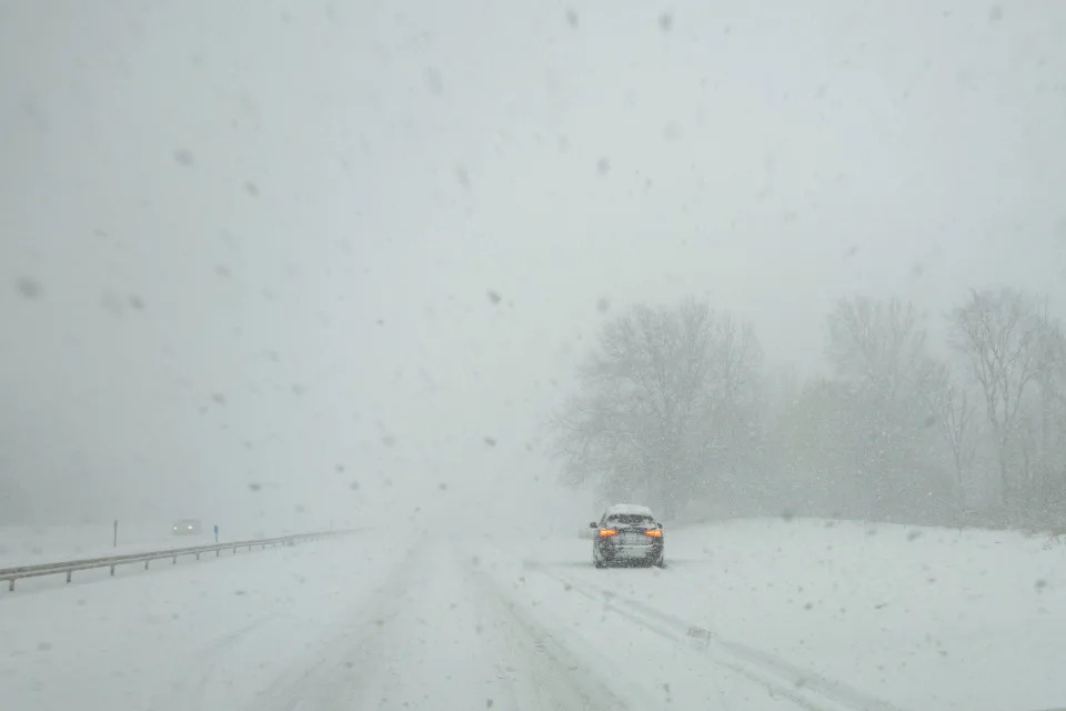 A vehicle pulls over along I-190 during a snowstorm hitting the Buffalo, N.Y., area in November.