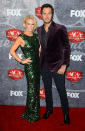 Luke Bryan and wife Caroline Boyer made quite the handsome couple ... him in his eggplant-colored velvet jacket and her in a sleeveless sequined green gown. And the “I Don’t Want This Night to End” crooner had no shame in soliciting fans for a little help in winning some of the many awards he was up for, tweeting on Friday: “Hey y'all! Heads up that voting for ACA Artist of the Year ends at midnight. You're the best fans ever!”