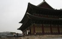 Visitors at the Changdeokgung Palace in Seoul. Built in the early 15th century, Changdeokgung Palace is one of the "Five Grand Palaces" built by King Taejong of the Joseon Dynasty. It suffered heavy damage during the Japanese occupation of Korea and less than a third of its original structures remain.