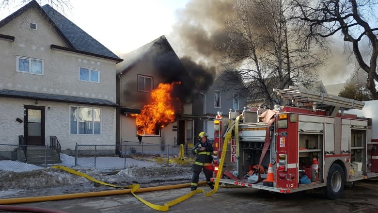 Crews fight West End house fire