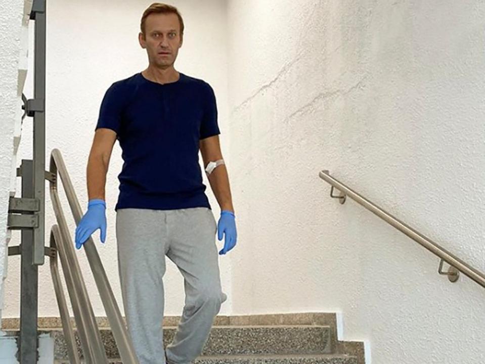 Russian opposition politician Alexei Navalny goes down the stairs at Charite hospital in Berlin (via REUTERS)