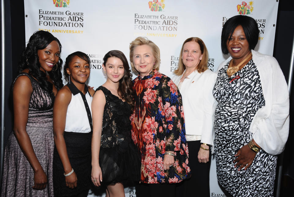 NEW YORK, NY - DECEMBER 03:  (L-R) EGPAF Ambassadors Fortunata Kasege, Florida Mwesiga, EGPAF Celebrity Ambassador Fatima Ptacek, Global Impact Award Recipient Hillary Rodham Clinton,  Ginny Courtney, EGPAF Ambassador Florence Ngobeni-Allen attend Elizabeth Glaser Pediatric AIDS Foundation's Global Impact Award Gala Dinner Honoring Hillary Clinton at Best Buy Theater on December 3, 2013 in New York City.  (Photo by Gary Gershoff/Getty Images for Elizabeth Glaser Pediatric AIDS Foundation)