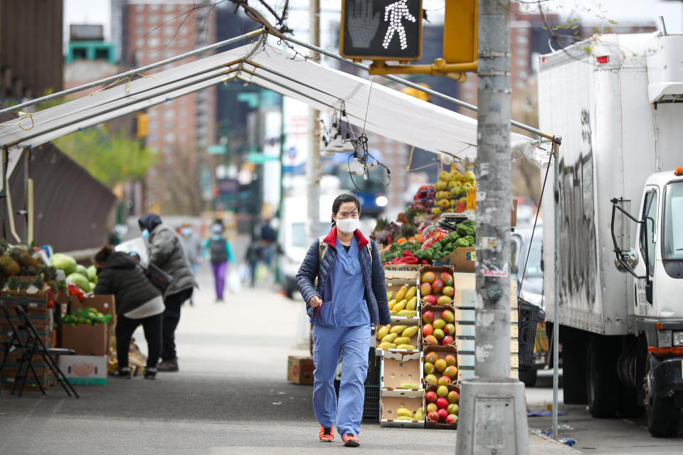 NEW YORK, USA - APRIL 20: A healthcare worker walks with a face mask in front of the Lincoln Hospital in the borough of Bronx, New York City, United States on April 20, 2020 due to Covid-19 pandemic. The state of New York continues to be the coronavirusâ U.S. epicenter. (Photo by Tayfun Coskun/Anadolu Agency via Getty Images)