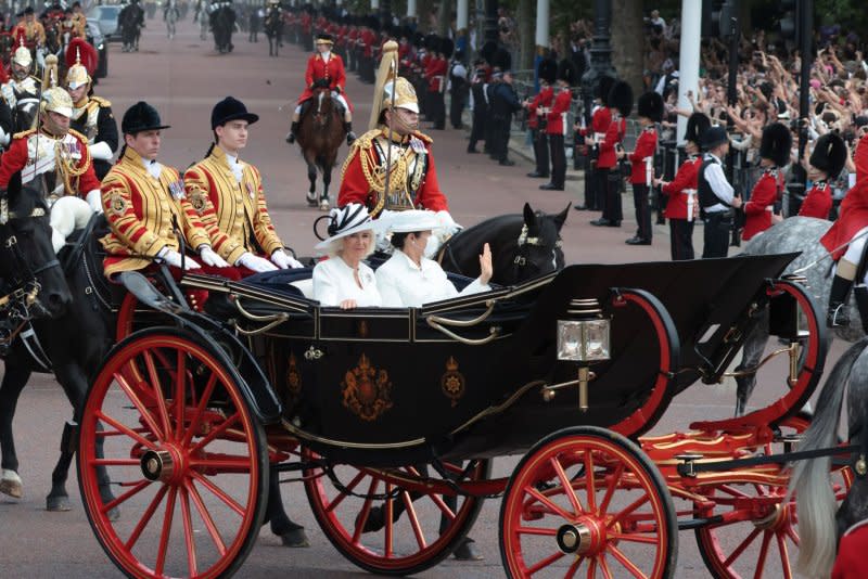 Queen Camilla (CL) and the Empress Masako (CR) travel by royal carriage to Buckingham Palace in London on Tuesday. The Emperor and Empress of Japan are on a three day state visit to the UK. Photo by Hugo Philpott/UPI