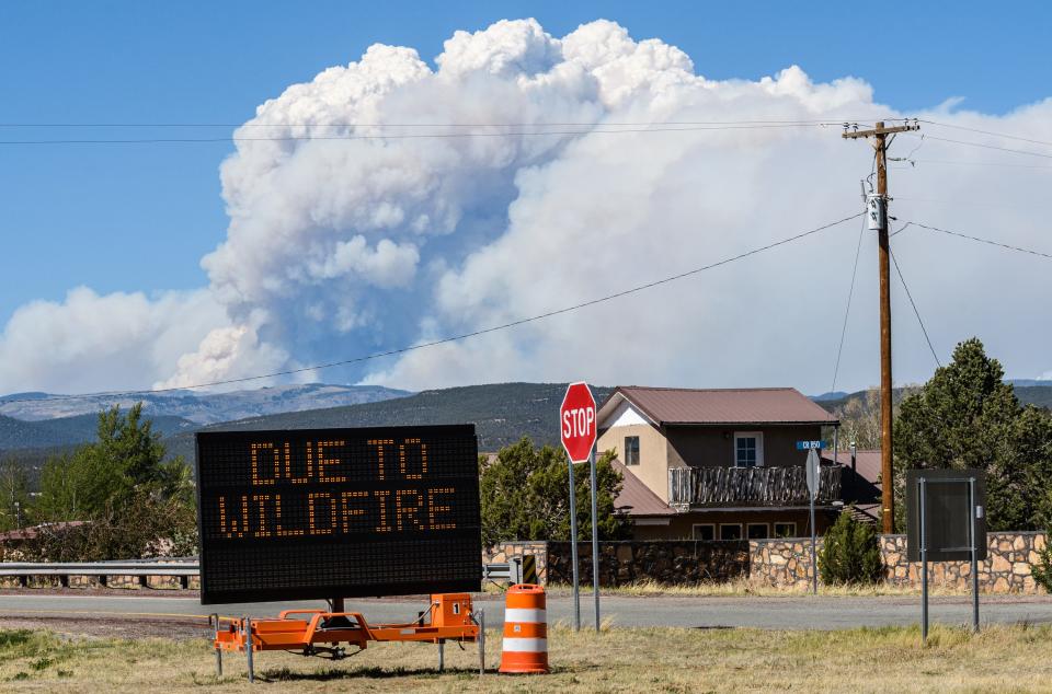 Smoke from the Calf Canyon / Hermits Peak fire billows north of Pecos, on May 14, 2022.