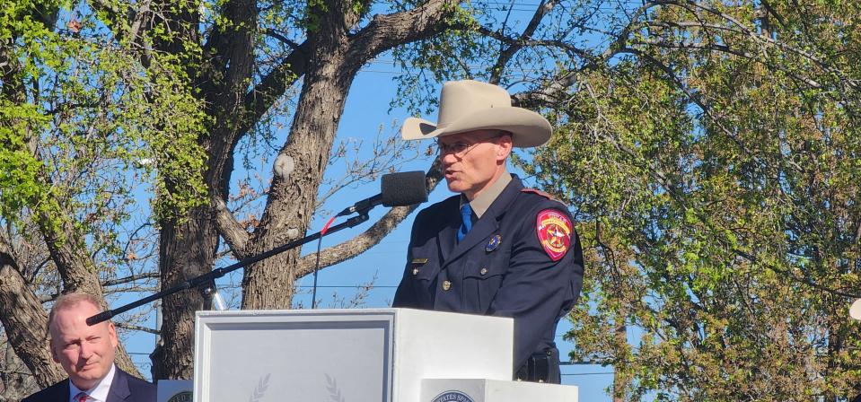 The director of DPS, Steven McCraw, speaks Thursday at the Texas Panhandle War Memorial Center in Amarillo during a boat dedication ceremony for fallen Trooper Steve Booth, who died in the line of duty in Stratford on June 16, 1993.