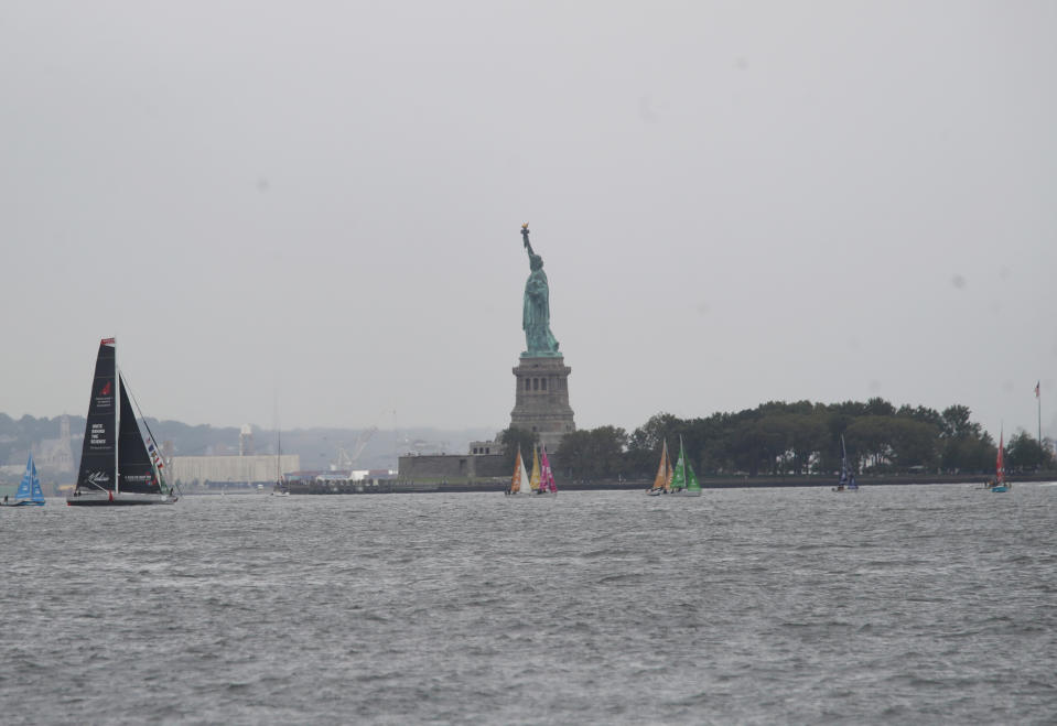 Greta Thunberg, a 16-year-old Swedish climate activist, sails into New York harbor aboard the Malizia II, Wednesday, Aug. 28, 2019. The zero-emissions yacht left Plymouth, England on Aug. 14. She is scheduled to address the United Nations Climate Action Summit on Sept. 23. (AP Photo/Mary Altaffer)