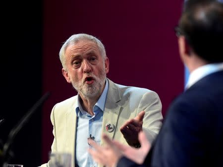Labour Party leader Jeremy Corbyn speaks during a debate against challenger Owen Smith in the first hustings event of the Labour leadership campaign in Cardiff, Wales, Britain August 4, 2016. REUTERS/Rebecca Naden